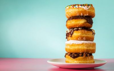 depositphotos_81806696-stock-photo-stack-of-assorted-donuts